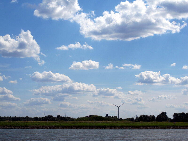 Wind Turbines on Riverbank