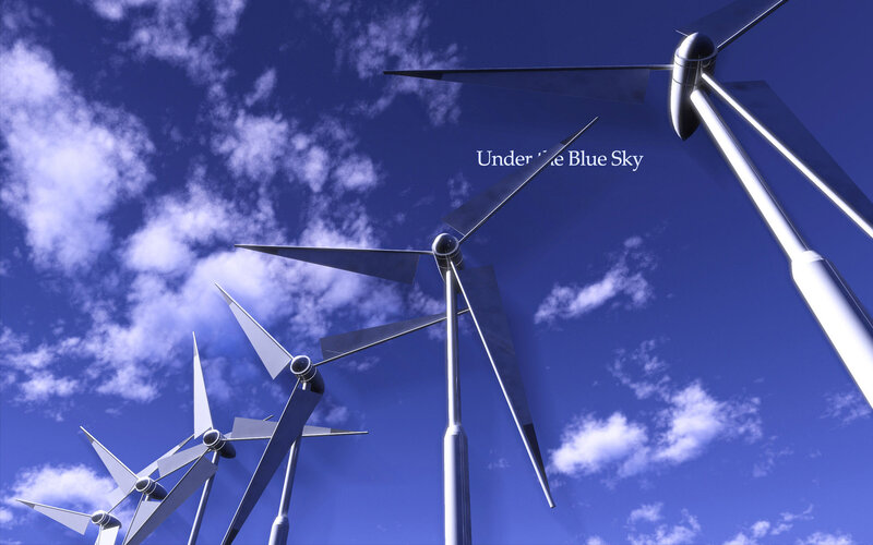 Wind turbines under blue sky