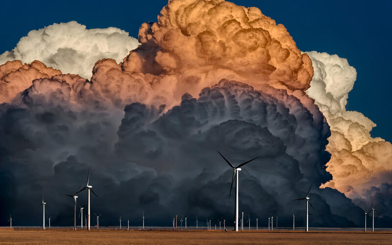 Wind Turbines under Storm Clouds — Blue, Dramatic