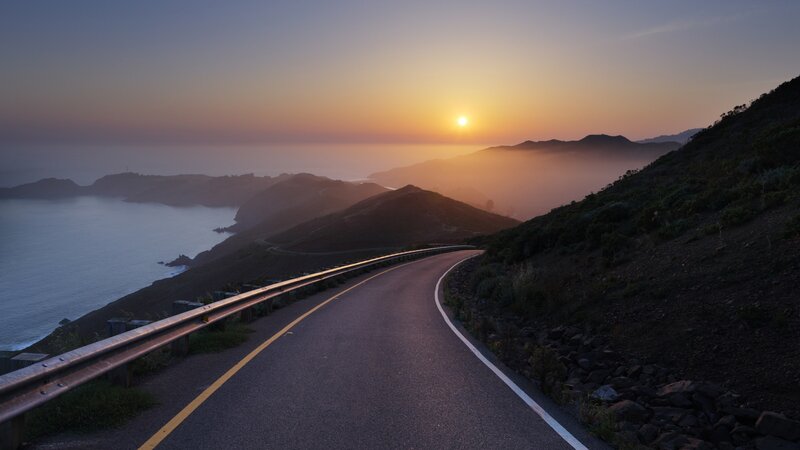 Winding Coastal Road — Orange, Serene, Sunset