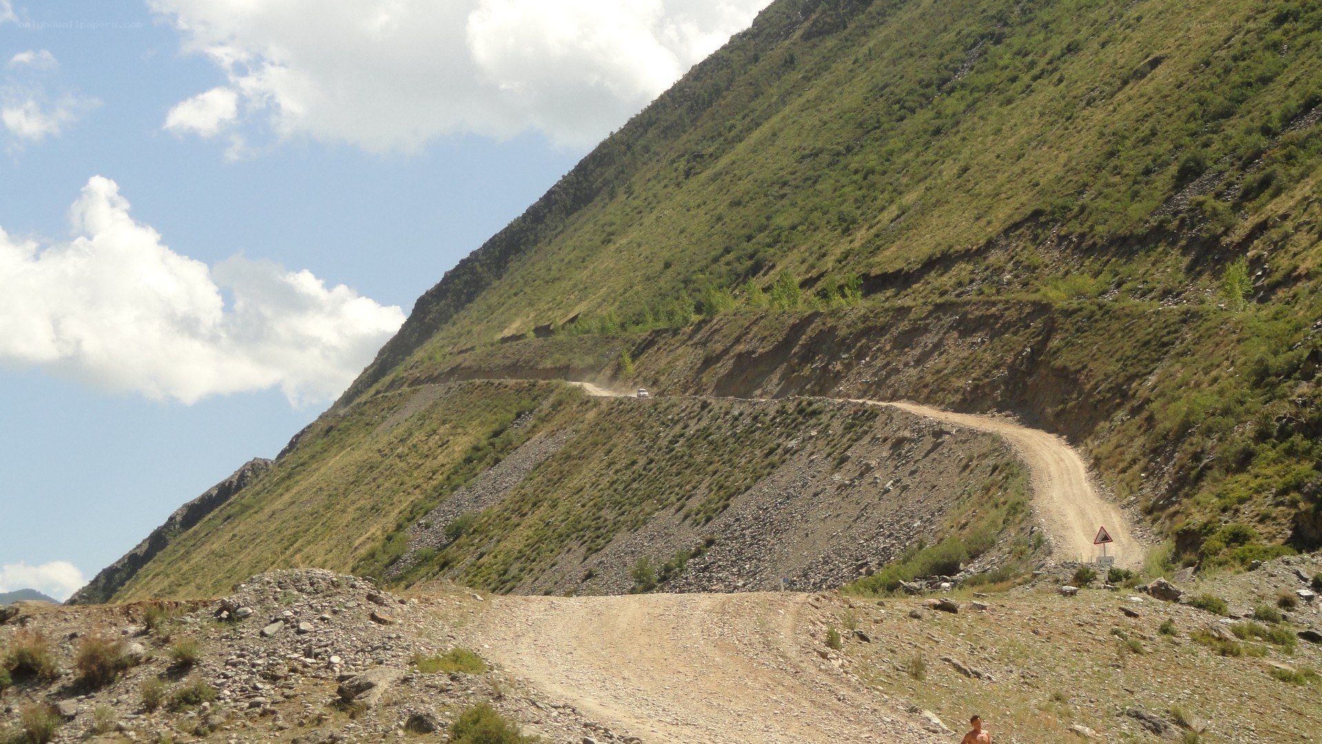 Winding dirt road on a mountain