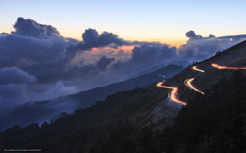 Winding mountain road at dusk