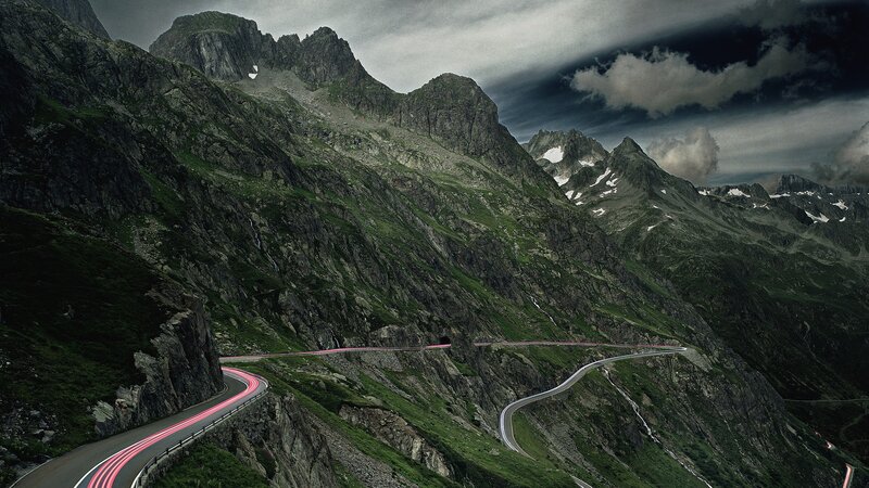 Winding mountain road at dusk