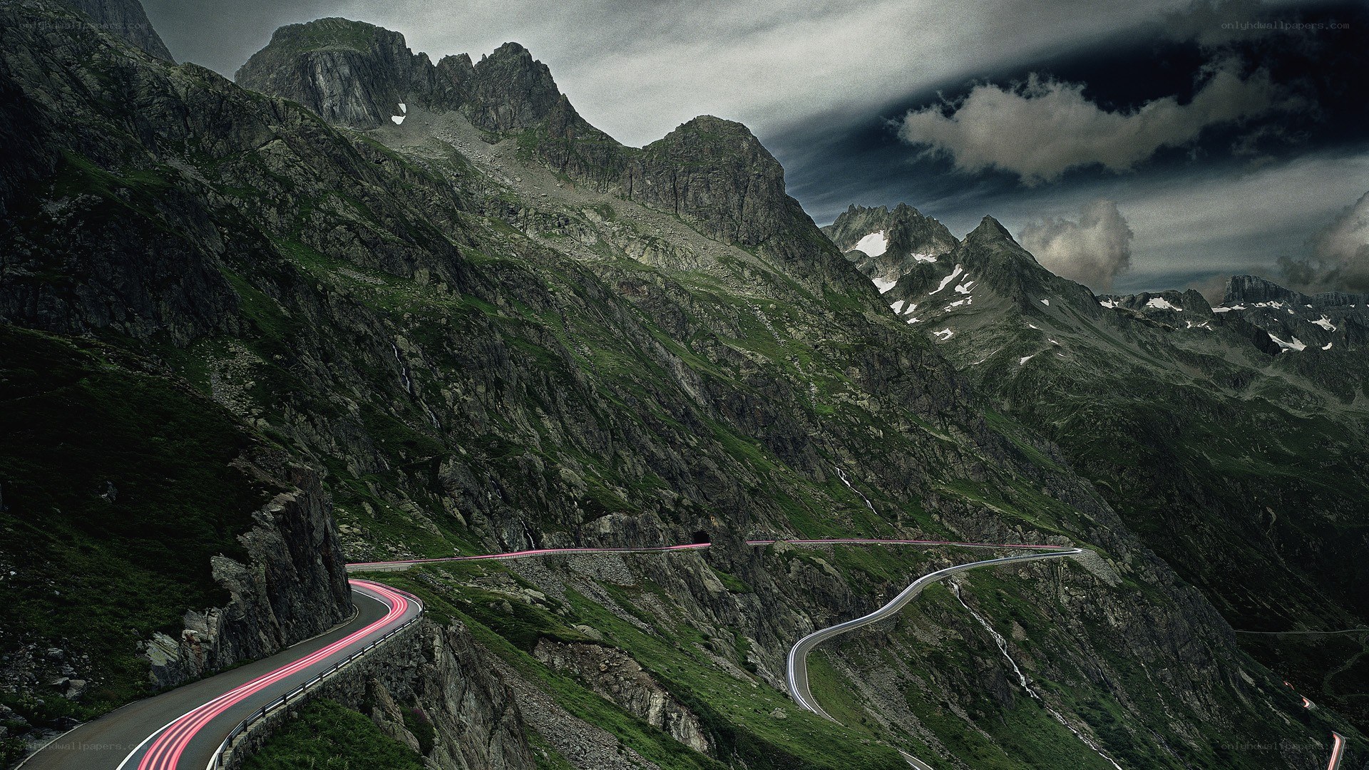 Winding mountain road at dusk