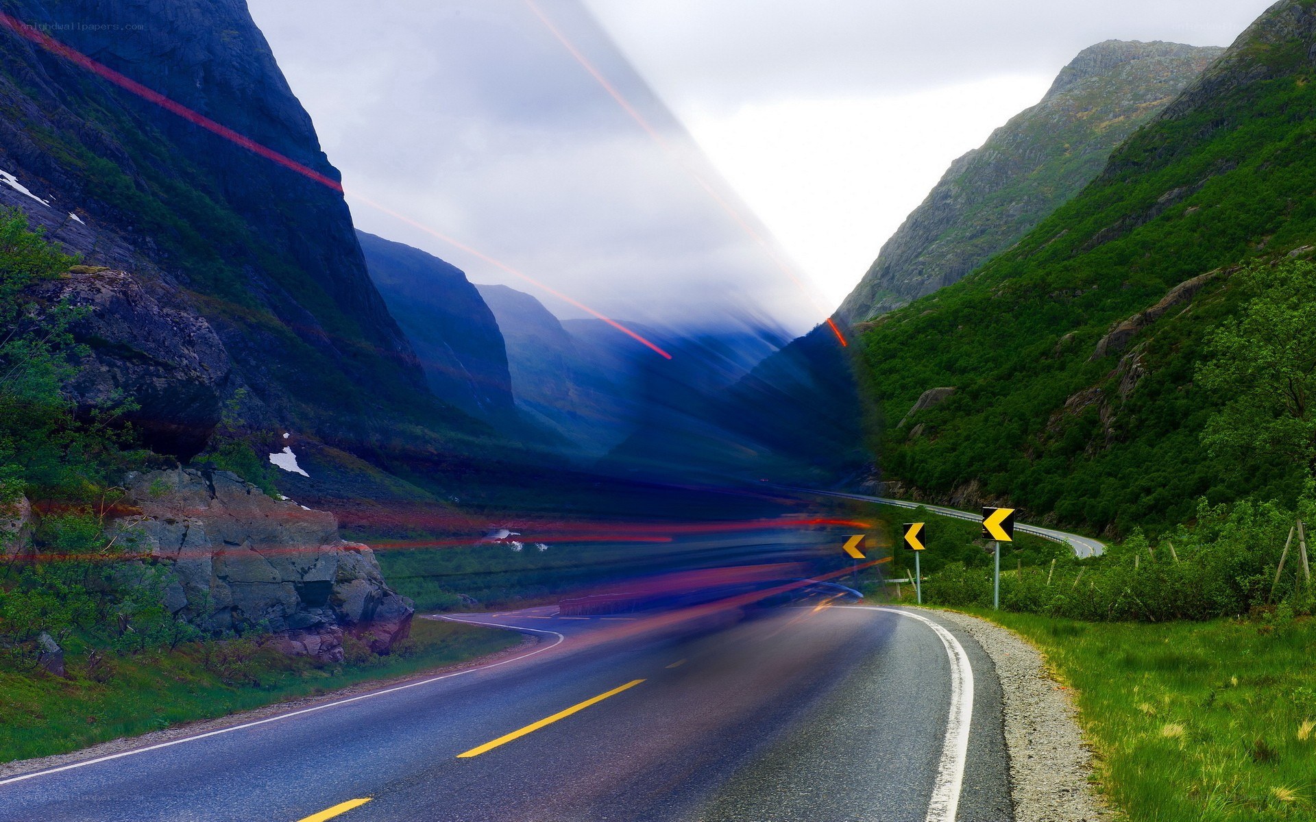 Winding mountain road at dusk