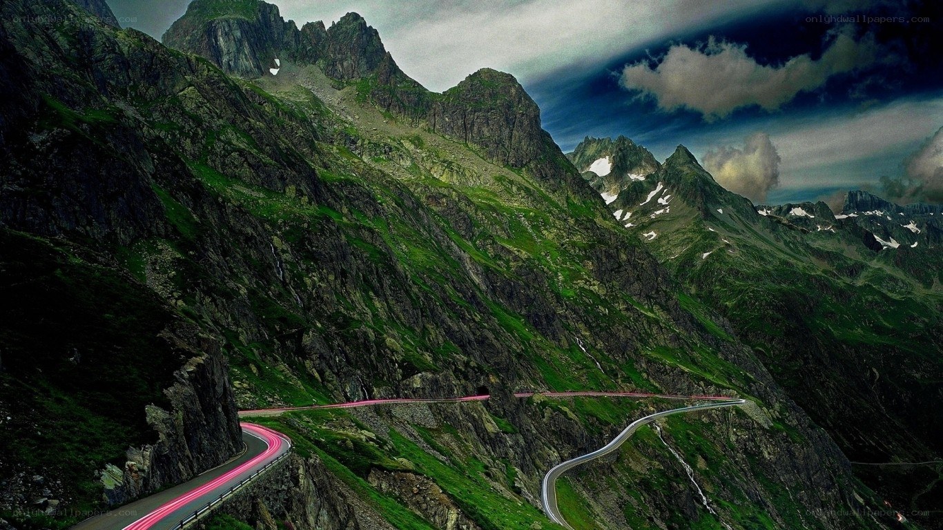 winding mountain road at dusk