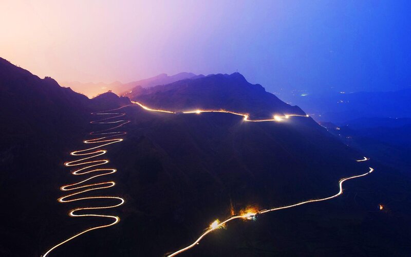 Winding Mountain Road — Blue, Dramatic, Night, Photograph, Mountains, Lights