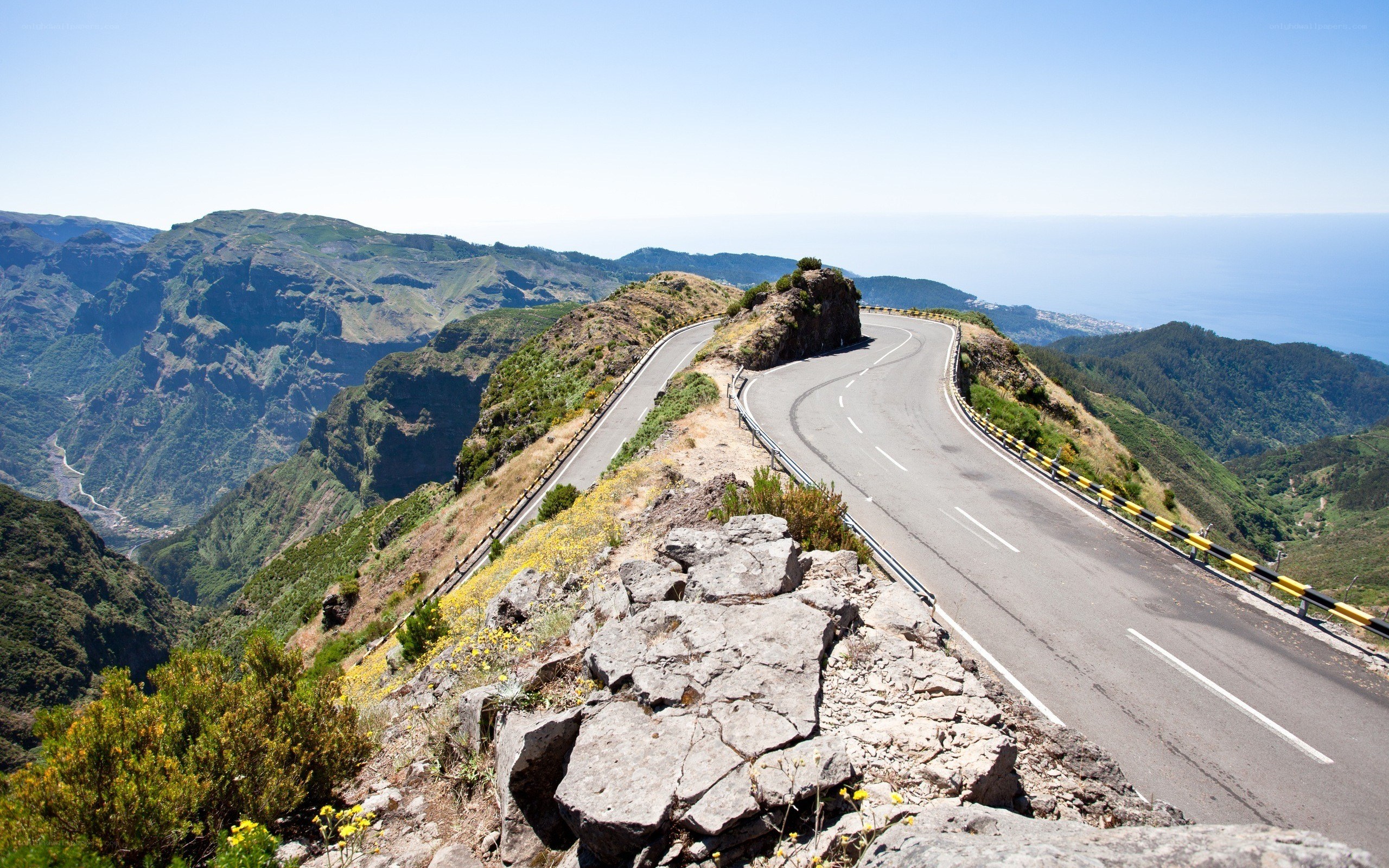 Winding mountain road by the sea