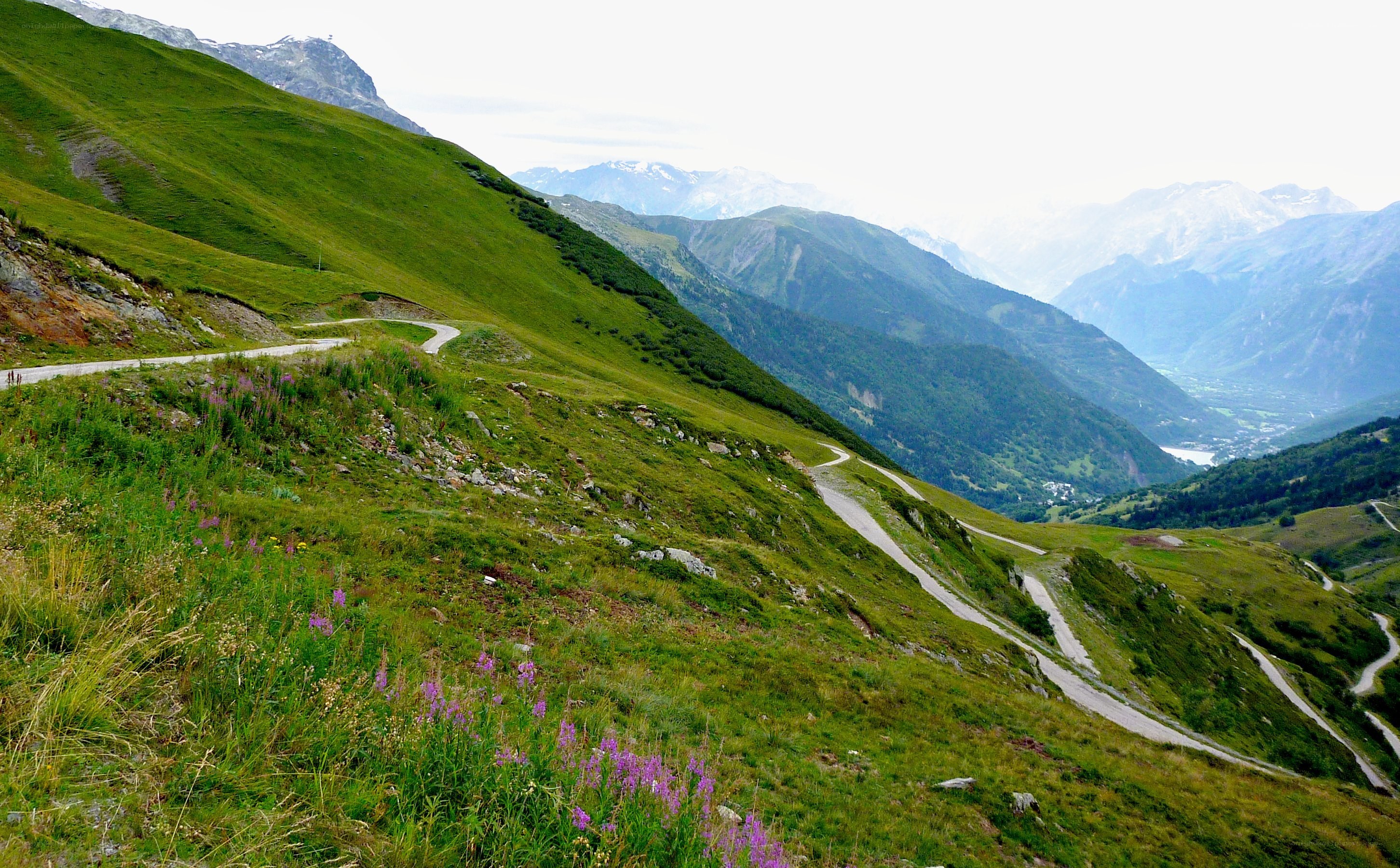 Winding mountain road in alpine valley