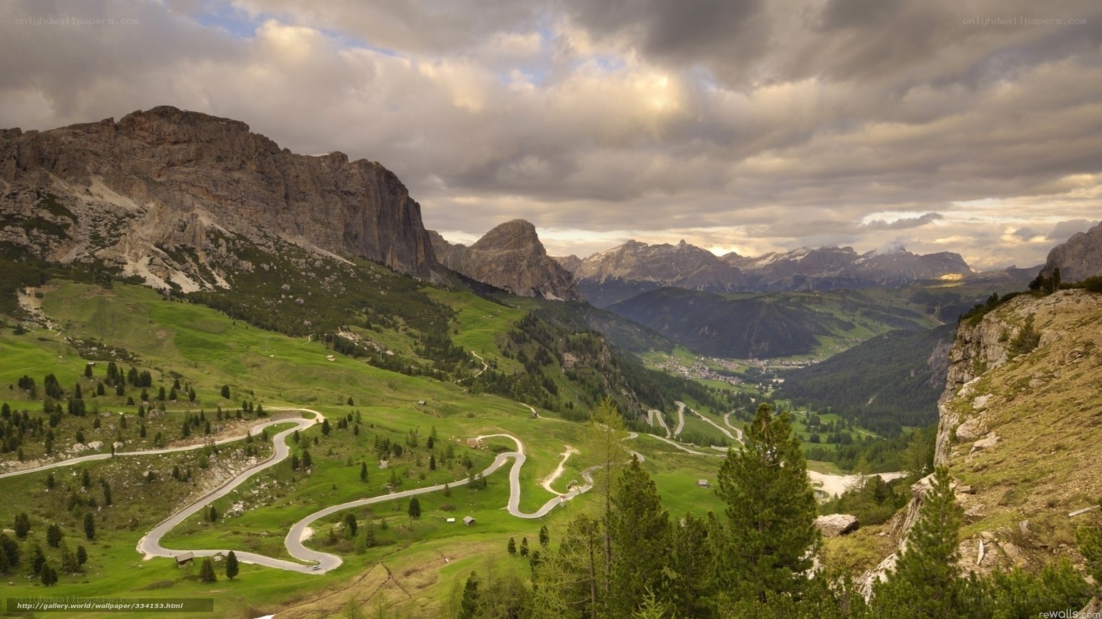 Winding mountain road in alpine valley