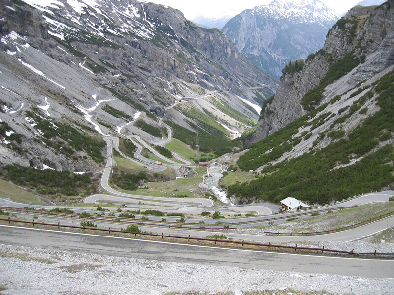 winding mountain road in alps