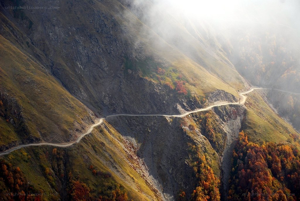 Winding mountain road in autumn
