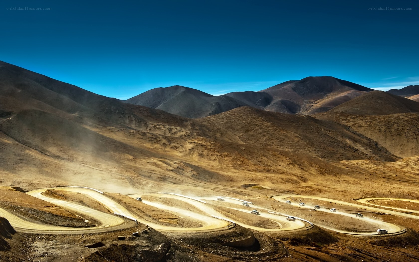 Winding mountain road in desert
