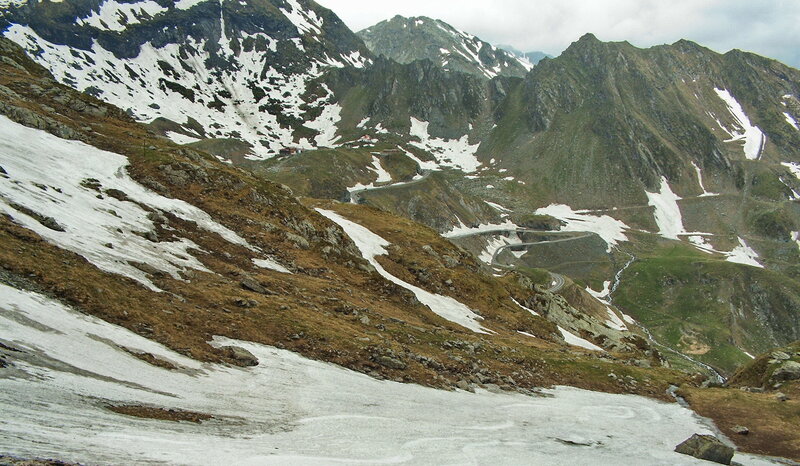 winding mountain road in snow