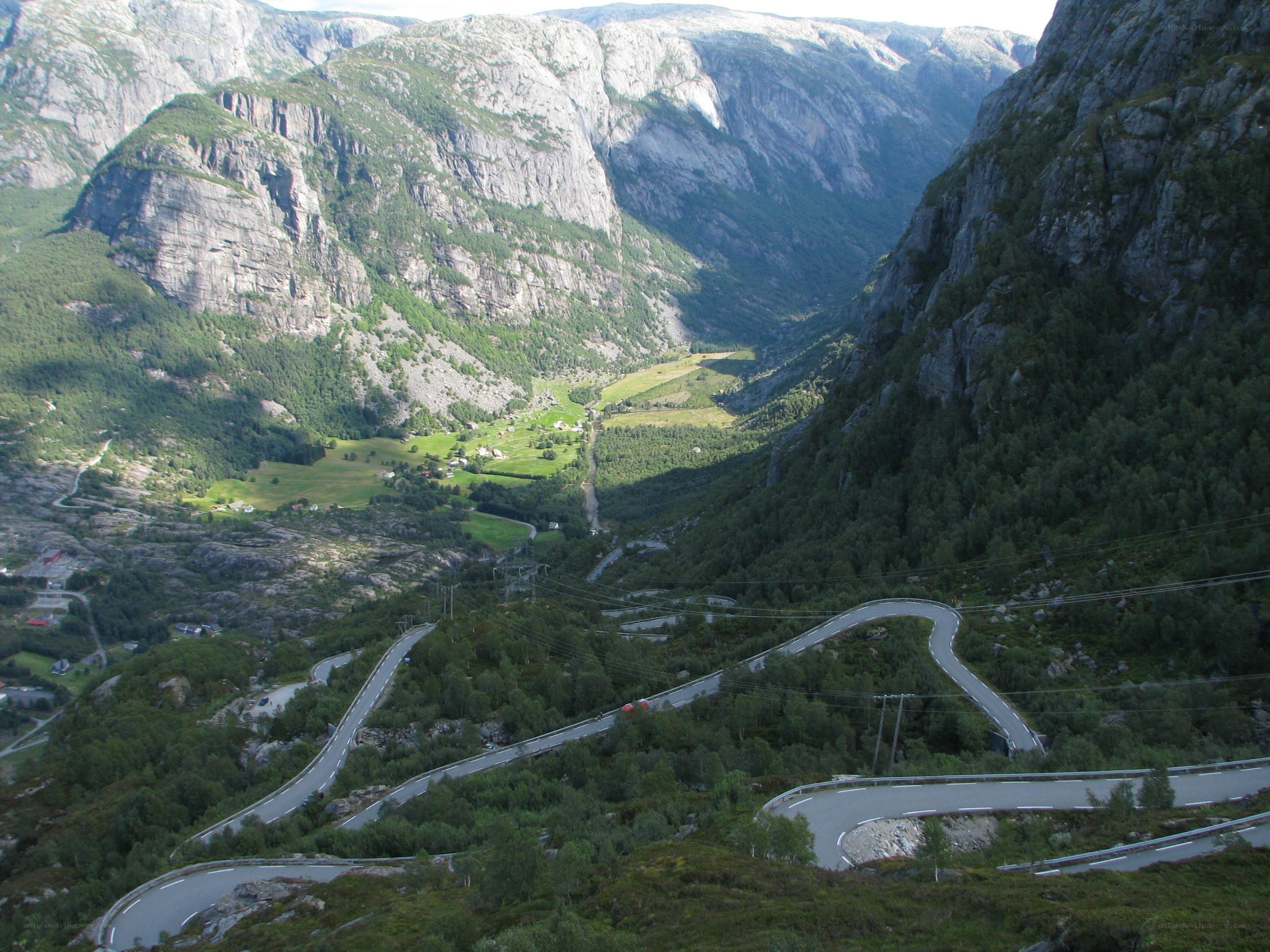 winding mountain road in valley