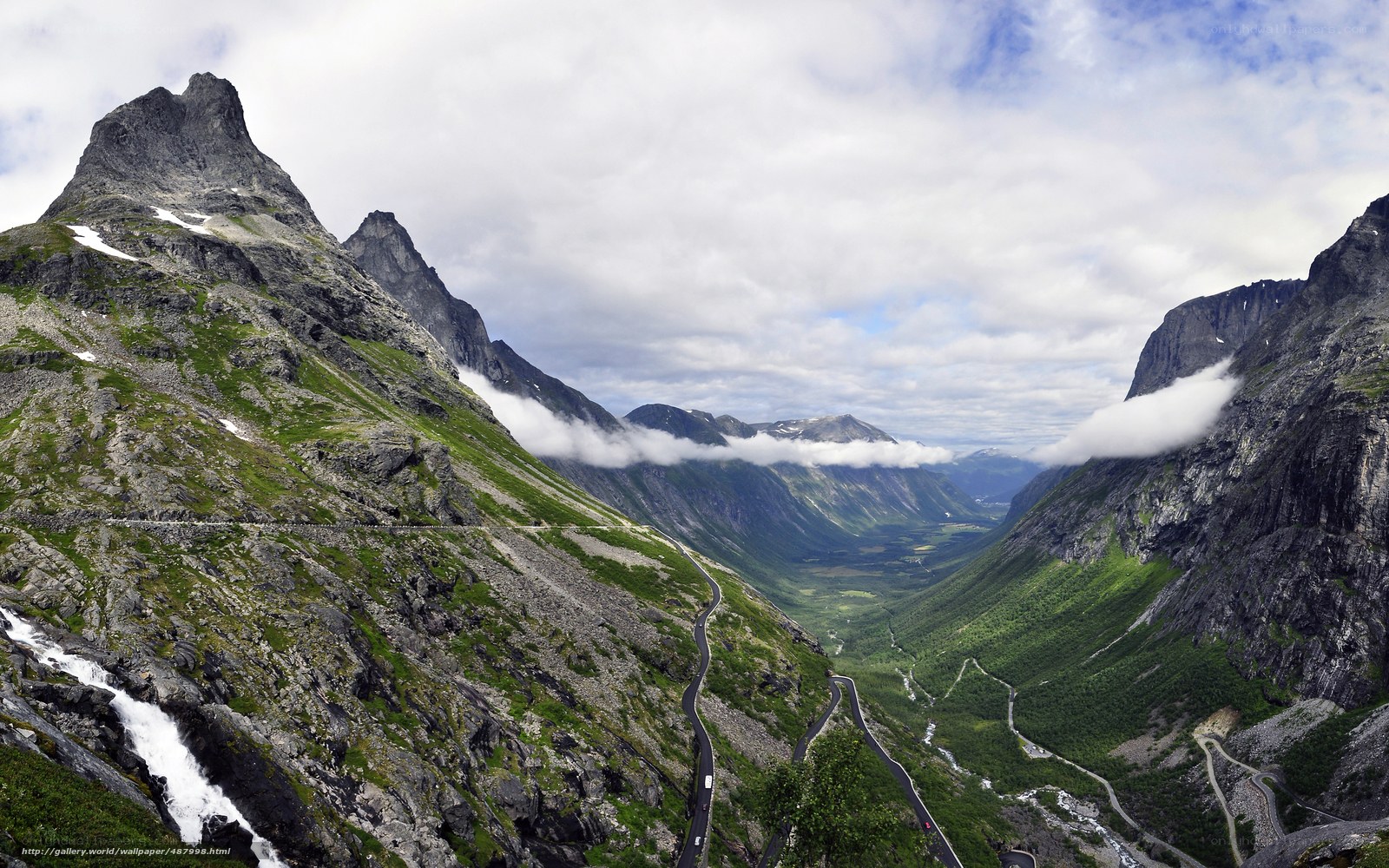 winding mountain road in valley