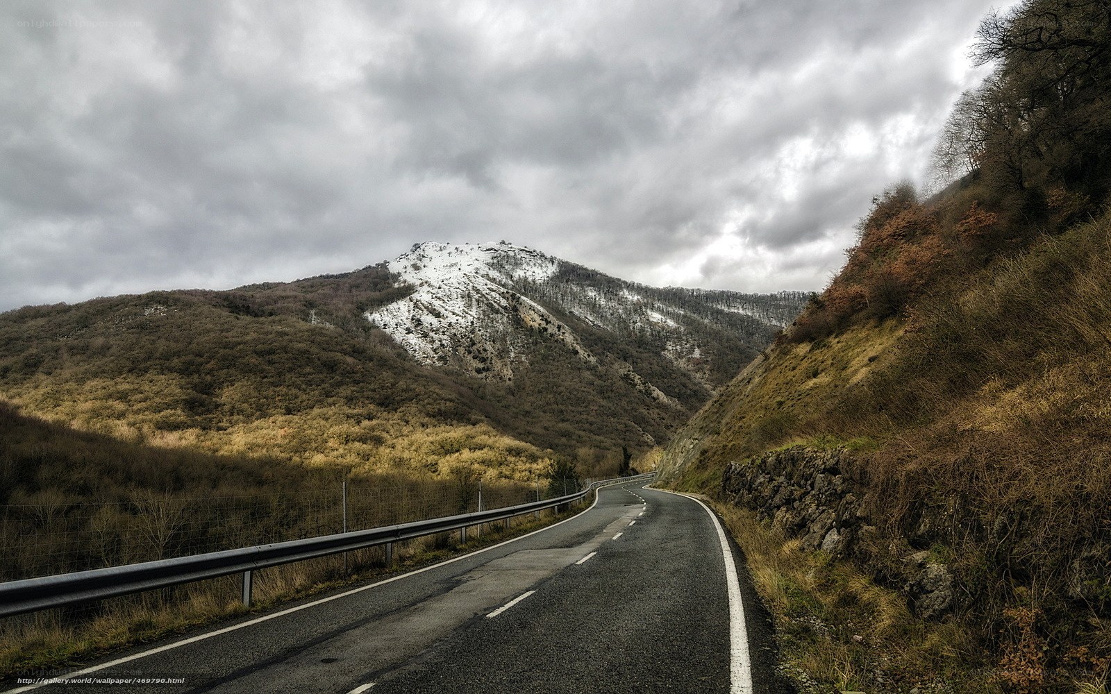 Winding mountain road in winter