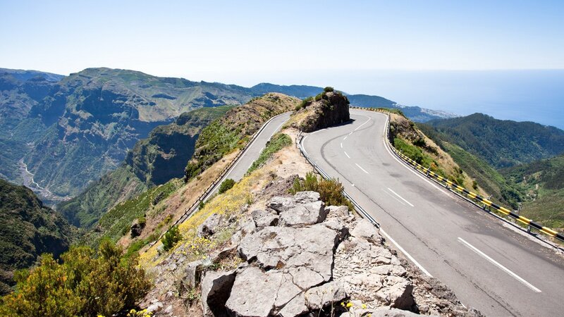 Winding mountain road overlooking the sea