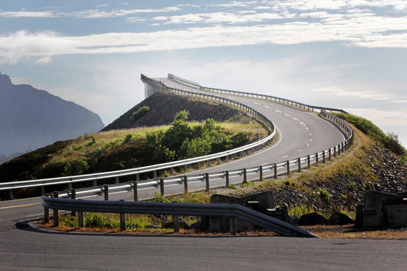 Winding mountain road with bridge