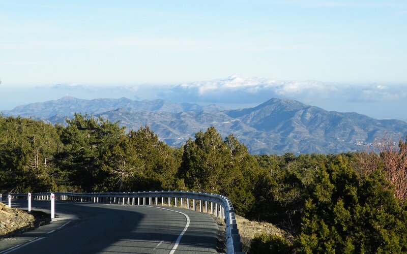 Winding mountain road with sea view