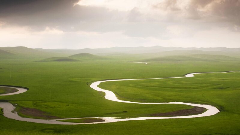 Winding River in Grassland — Green, Serene, Afternoon, Photograph