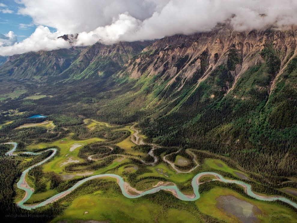 Winding river in mountain valley