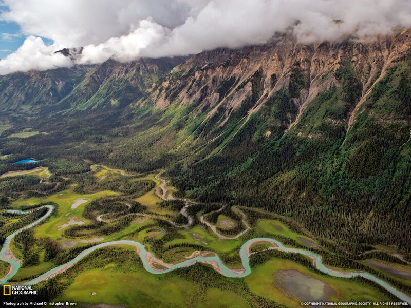 Winding river in mountain valley