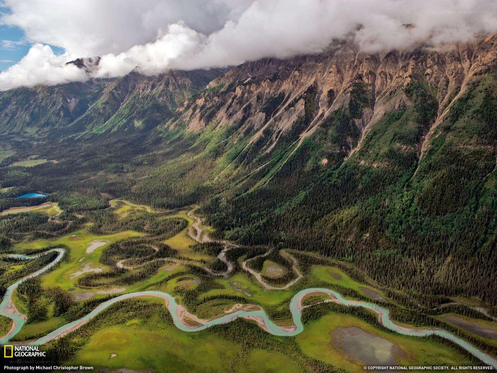 Winding river in mountain valley
