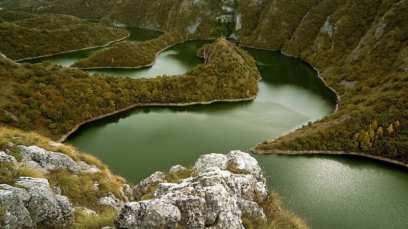 Winding River in Mountains — Green, Serene