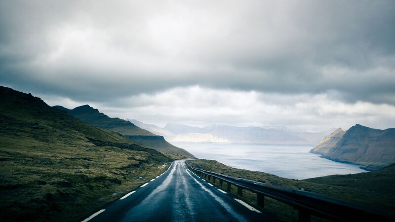 Winding road along a coastal fjord