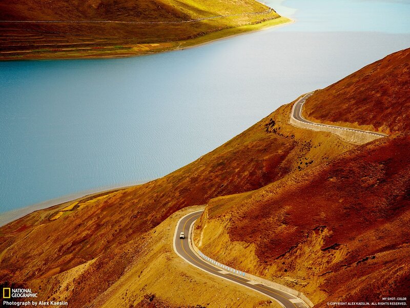 Winding road along a lake