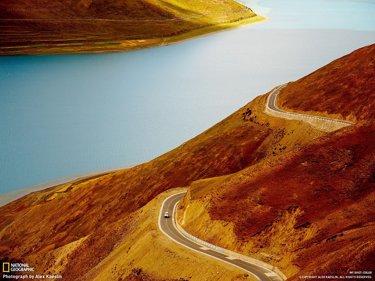 Winding road along a lake
