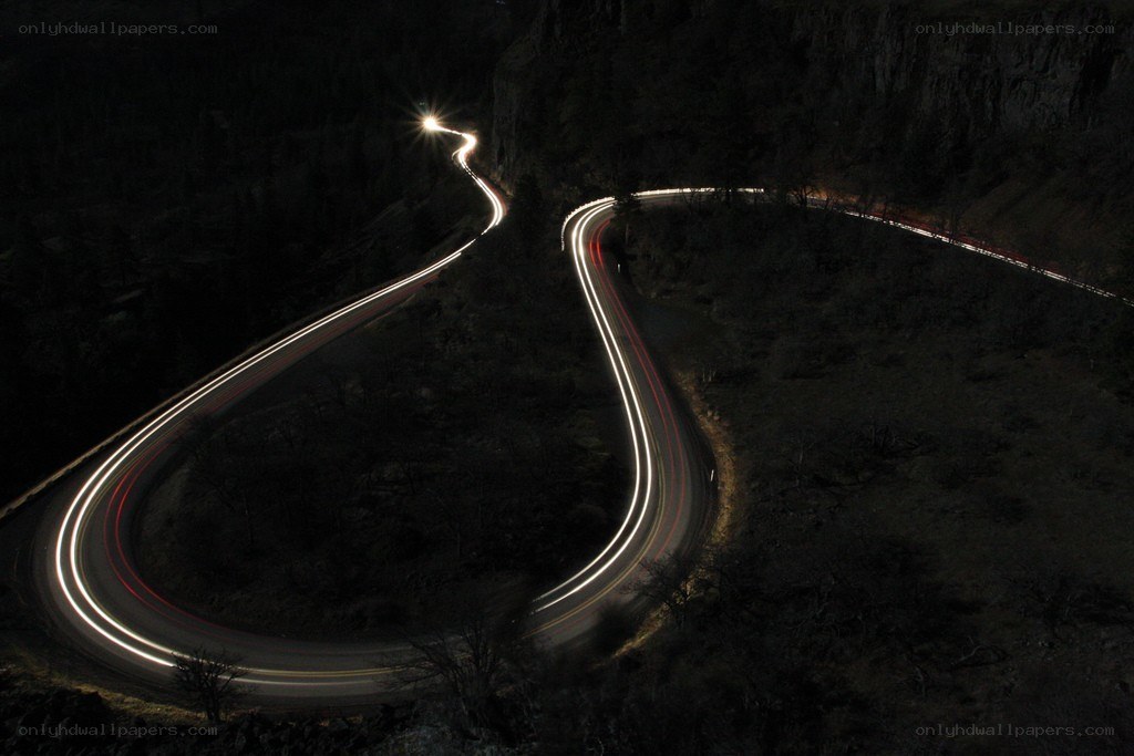 Winding road at night