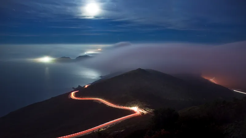 Winding road at night with moonlight
