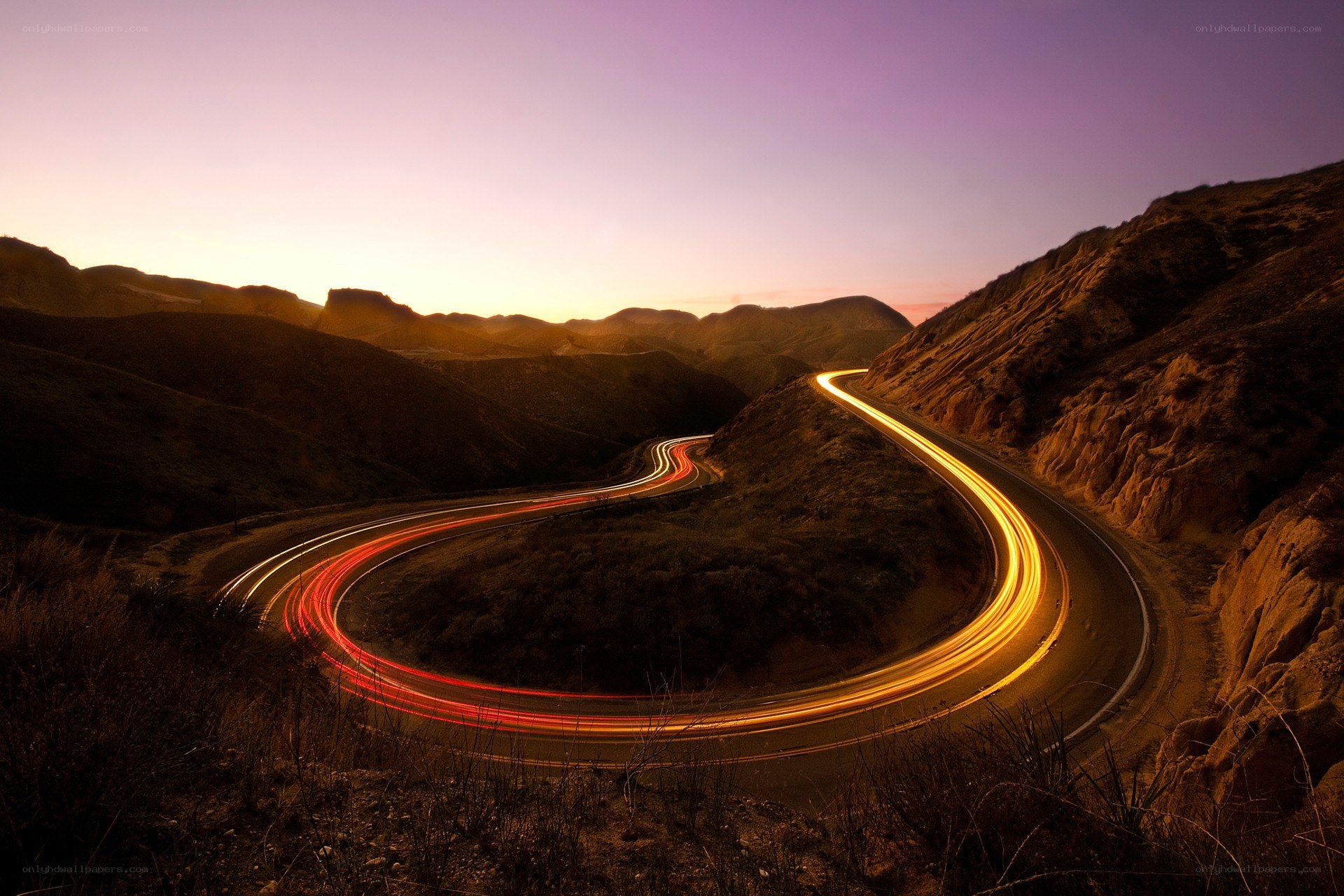 Winding road at sunset