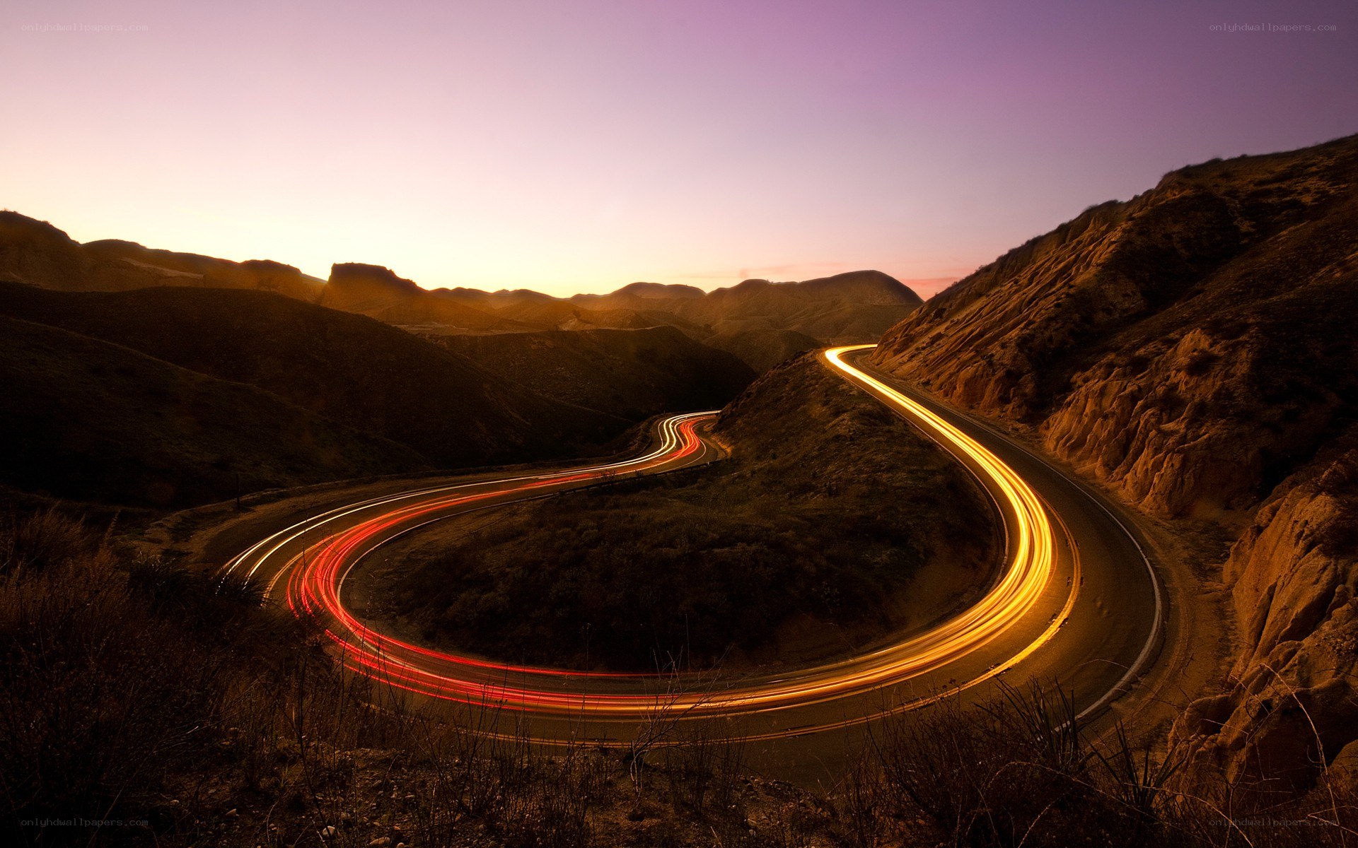 Winding road at sunset