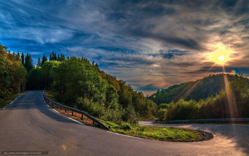 Winding road at sunset