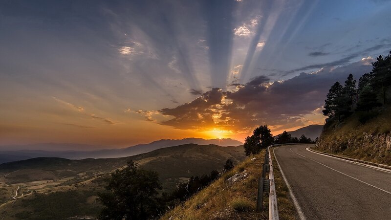 Winding Road at Sunset — Orange, Dramatic, Photograph, Mountains, Sunlight