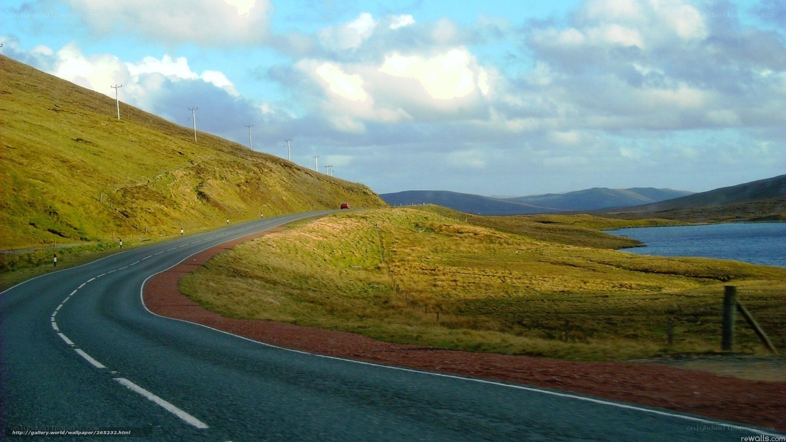 Winding road by a lake