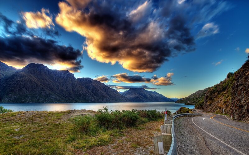 Winding Road by Lake — Sunset