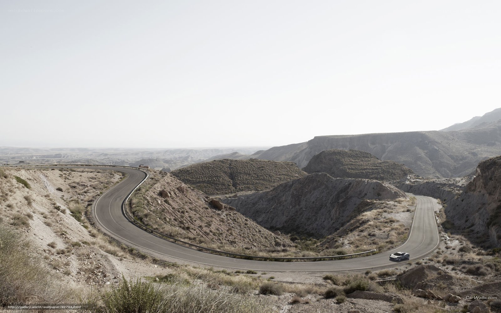 Winding road in arid landscape