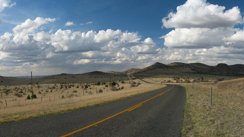 Winding Road in Desert — Blue, Serene, Afternoon, Photograph
