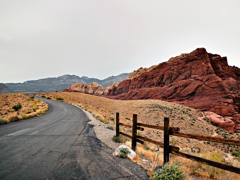 Winding Road in Desert — Red, Desolate, Afternoon, Photograph, Mountains