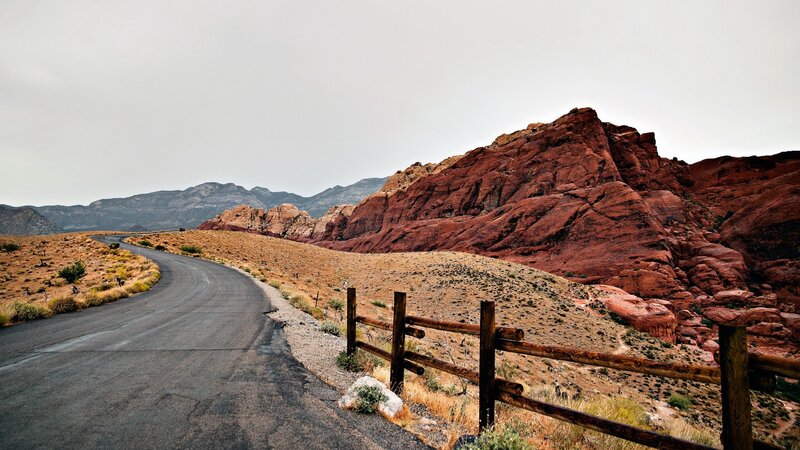 Winding Road in Desert — Red, Desolate, Photograph, Rock Formations