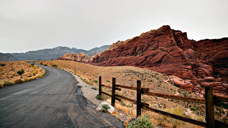 Winding Road in Desert — Red, Desolate, Photograph