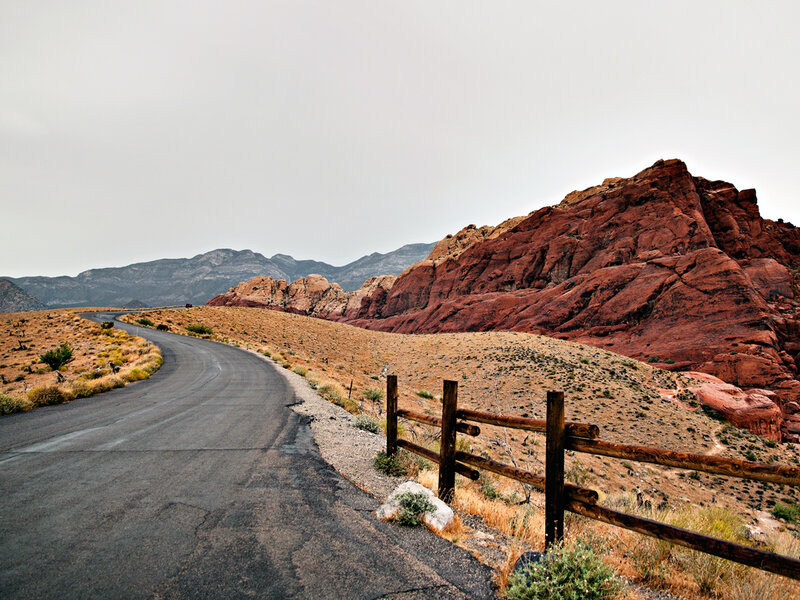 Winding Road in Desert — Red, Desolate