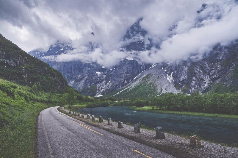 Winding Road in Mountain Valley — Green, Dramatic, Photograph