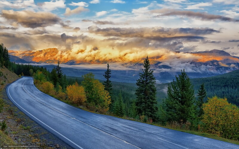 Winding Road in Mountains — Blue, Dramatic, Sunrise, Photograph