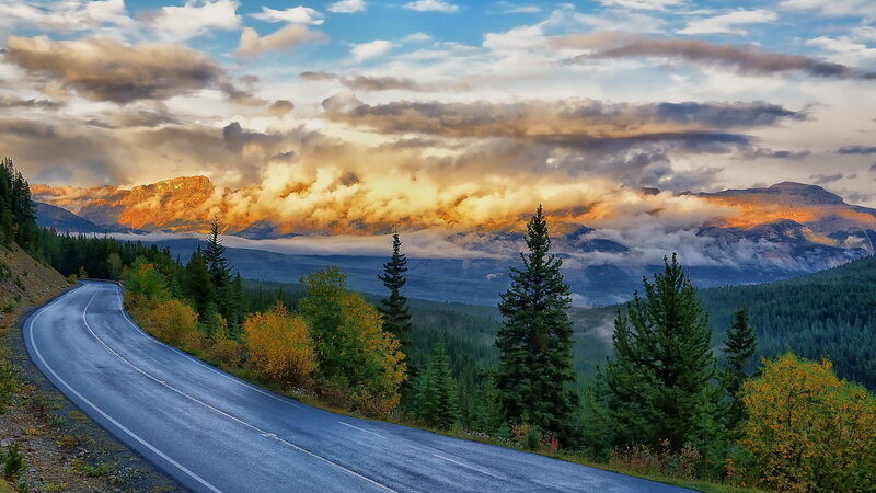 Winding Road in Mountains — Blue, Dramatic, Sunset, Photograph