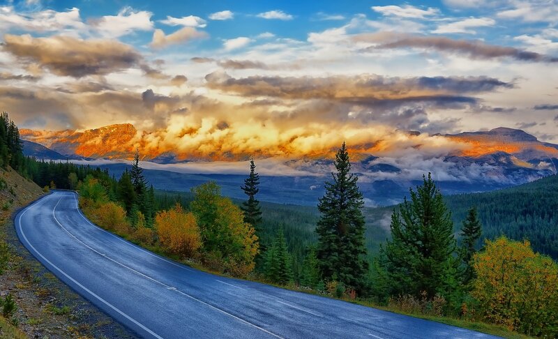 Winding Road in Mountains — Blue, Dramatic, Sunset, Photograph, Trees